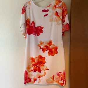 Floral and white mini dress with flutter sleeve and V back